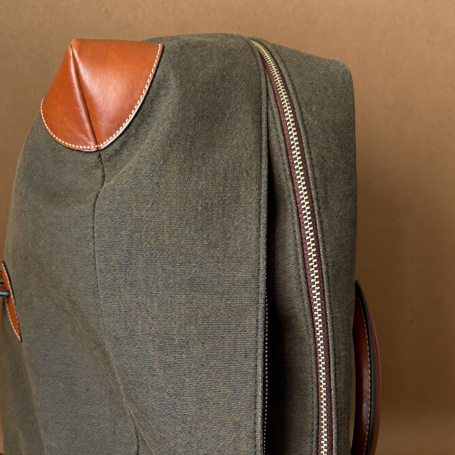 Waxed canvas and leather corner detail