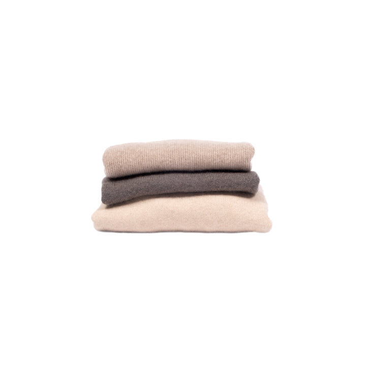 Women's wool and yak sweater stack, side view