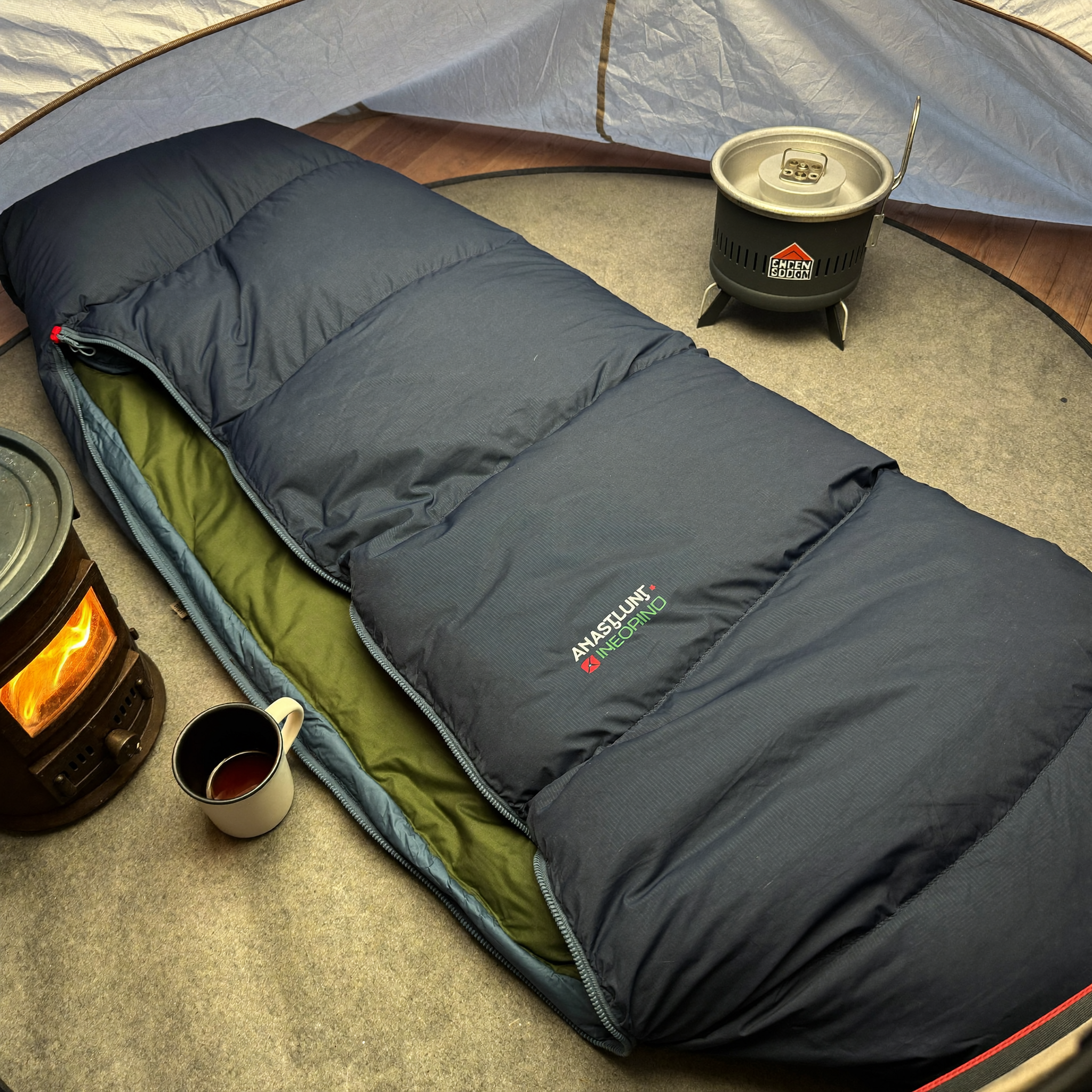 Expedition Sleeping Bag beside the stove