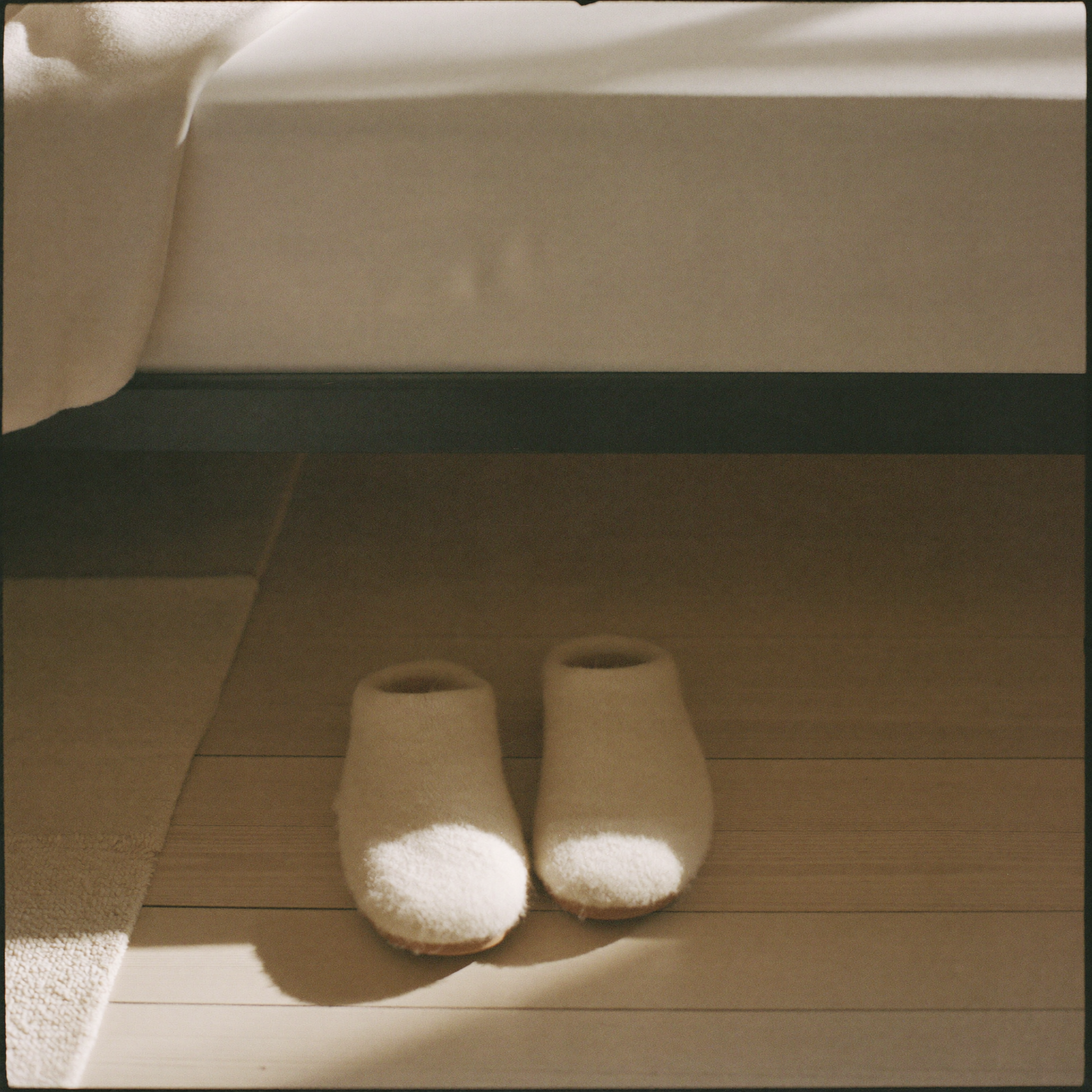 Felted Wool Slippers on the morning floor