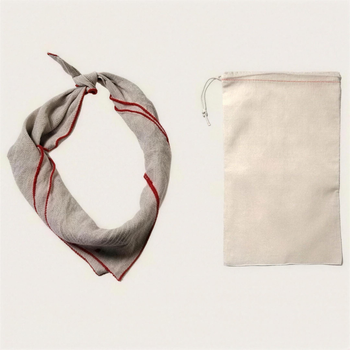 Rolled with its drawstring pouch